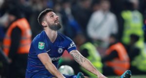 Olivier Giroud reacts to Chelsea signing Gonzalo Higuain