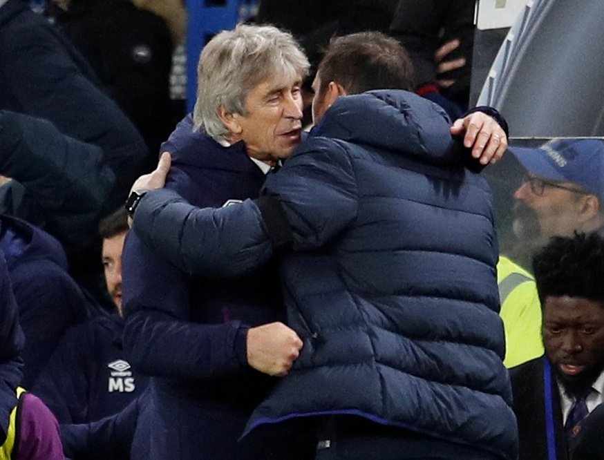 Pellegrini gets support from team after Chelsea win